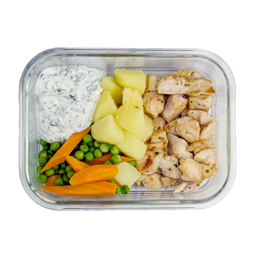 Lunchbox mit Hähnchen und gekochtem Gemüse