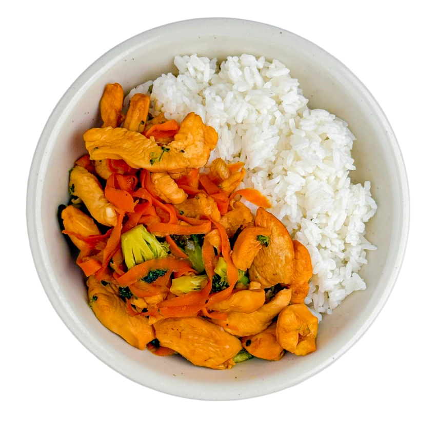 Chicken slices in caramel with rice and broccoli