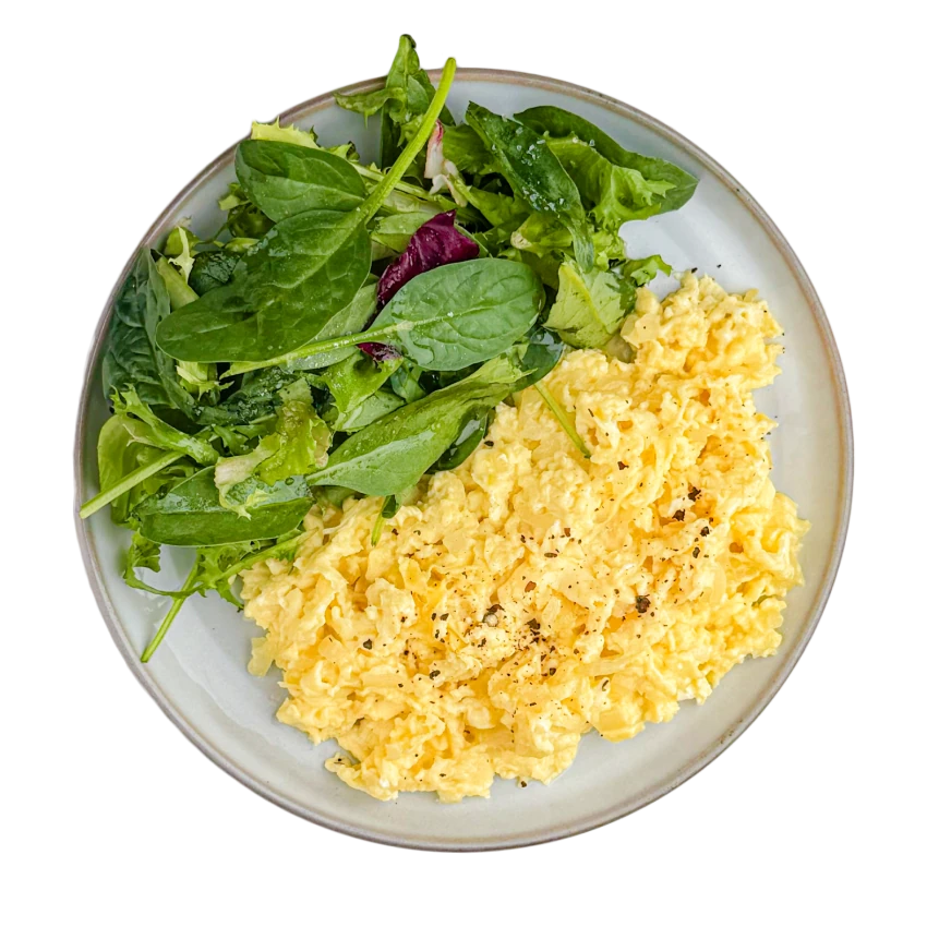 Scrambled Eggs with Sauteed Onions and Salad