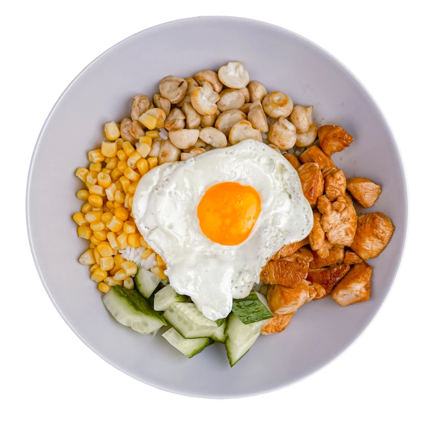 Bowl with Chicken, Sunny-Side-Up Egg, Mushrooms and Vegetables