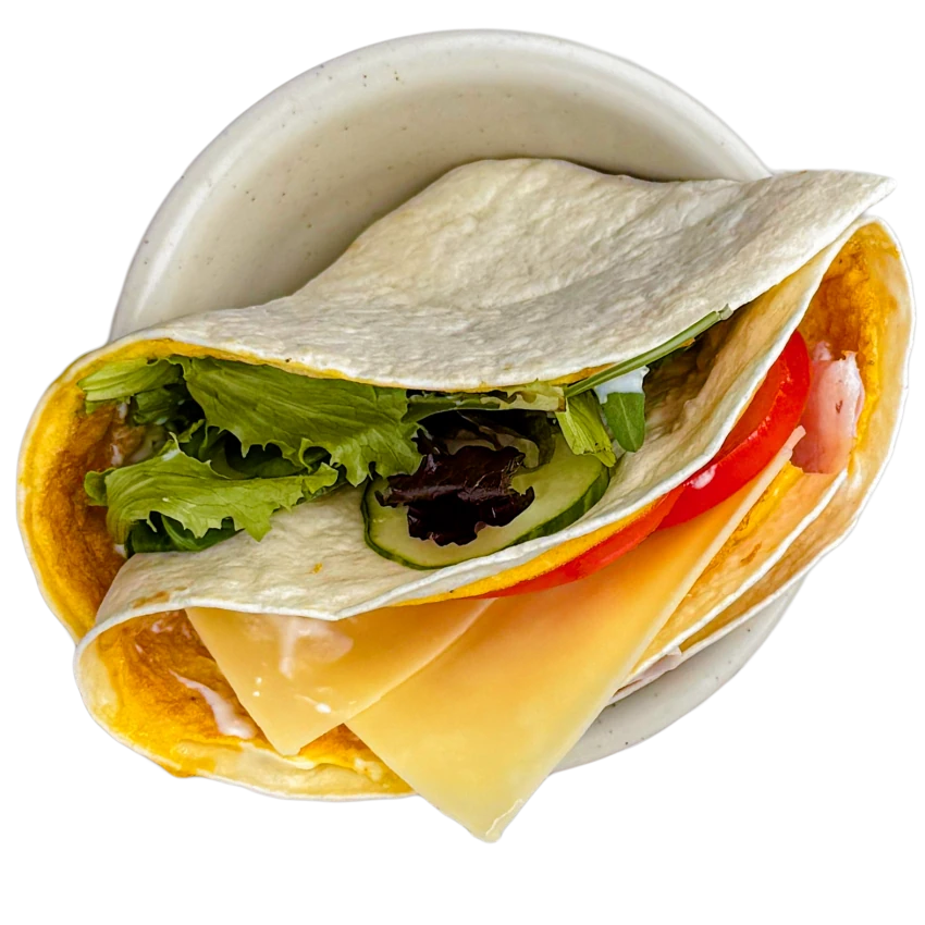 Breakfast tortilla wrap with ham and cheese