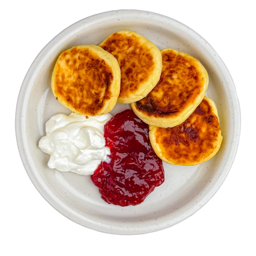 Quark (Syrniki) pancakes with jam and sour cream