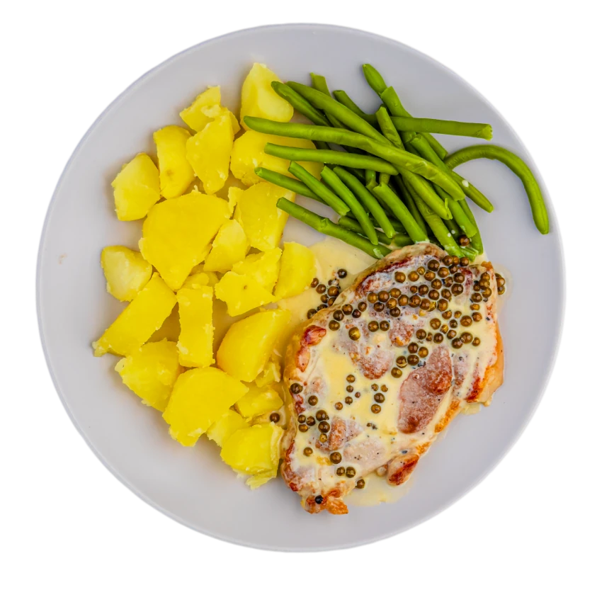 Pork neck steak with pepper sauce and green beans