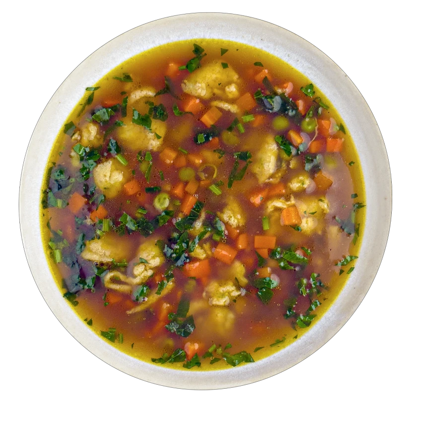 Spring vegetable soup with drop dumplings