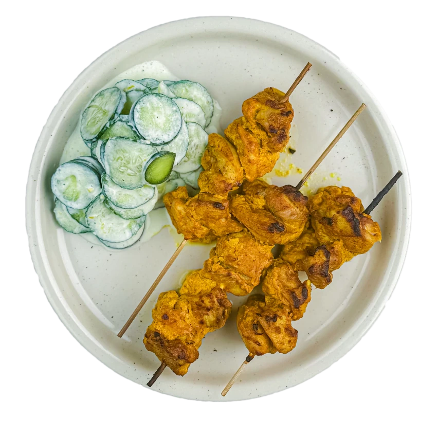 Chicken tikka masala skewers with cucumber salad