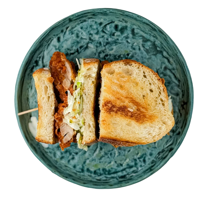 Sandwich with Fried Chicken, Cabbage Salad and Pickles