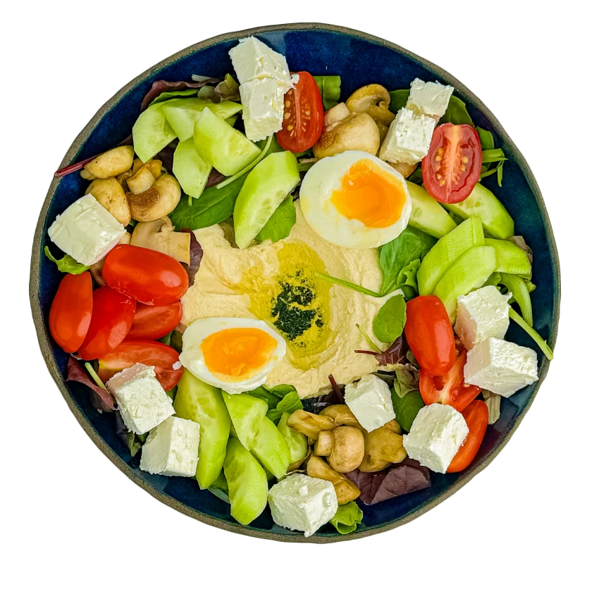 Schüssel mit Hummus und Feta-Käse